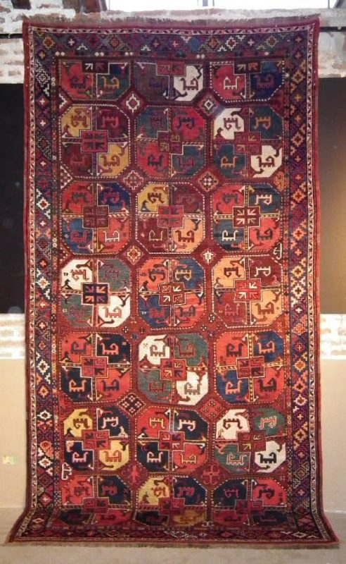 A large impressing 19th century Uzbek Karakalpak carpet exhibited by Mohammad Tehrani.
