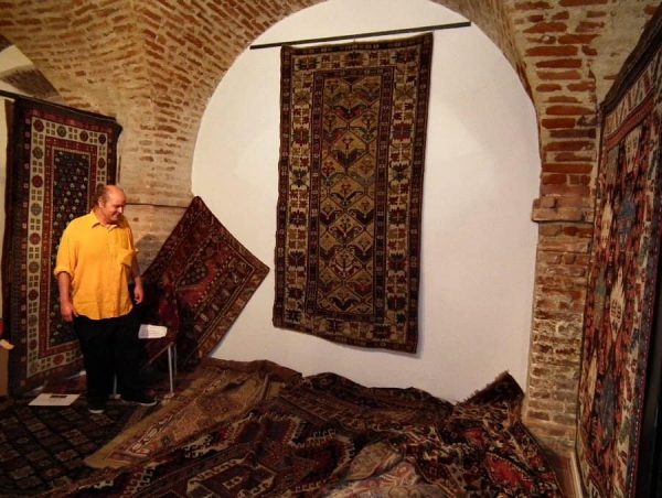 Eber Meschoulam in the antique rug part of his stands.