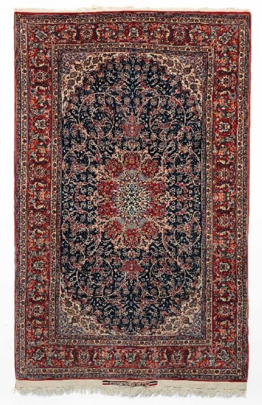 Isfahan Seirafian Isfahan rug, Persia. Classical medallion design. Knotted with kork wool on silk warps. Signed: Seirafian Isfahan Iran. C. 1 mio. kn. pr. sqm. Mid 20th century. årh. 234 x 145 cm. Est. 2000-3000.- Euro