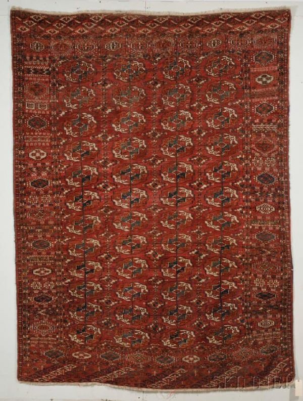 Lot 76  Tekke Main Carpet, West Turkestan, second half 19th century, 9 ft. 2 in. x 6 ft. 11 in.  Estimate ,000-3,000