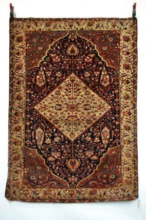 Lot 1535, a Sarouk rug, north west Persia, late 19th century, 6ft. 7in. x 4ft. 8in. 2.01m. x 1.42m. Estimate: £1000-1500