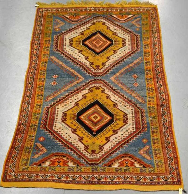 Lot 1678, a Rabat carpet, Middle Atlas, Morocco, mid-20th century, 9ft. 11in. x 6ft. 1in. 3.02m. x 1.86m. Estimate: £300-400