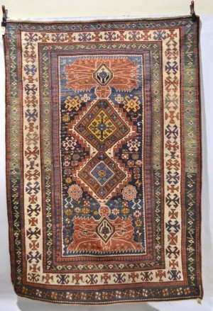 Lot 403. 	Kazak long rug of hexagonal column design, south west Caucasus, last quarter 19th century, 7ft. 11in. x 5ft. 5in. 2.41m. x 1.65m. Estimate: £2,500-3,500