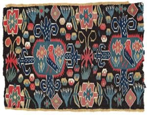 Lot 292. A carriage cushion fragment, tapestry weave, "Den innelykta fågeln", ca 52 x 67 cm, Scania (Sweden). Estimate 1.113 - 1.391 EUR