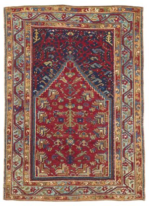 AN USHAK PRAYER RUG