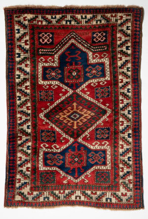 KAZAK THREE MEDALLION PRAYER RUG DATED AH1261